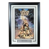 Chevy Chase Signed In Blue Framed 11x17 European Vacation Photo JSA Hologram - Sports Integrity