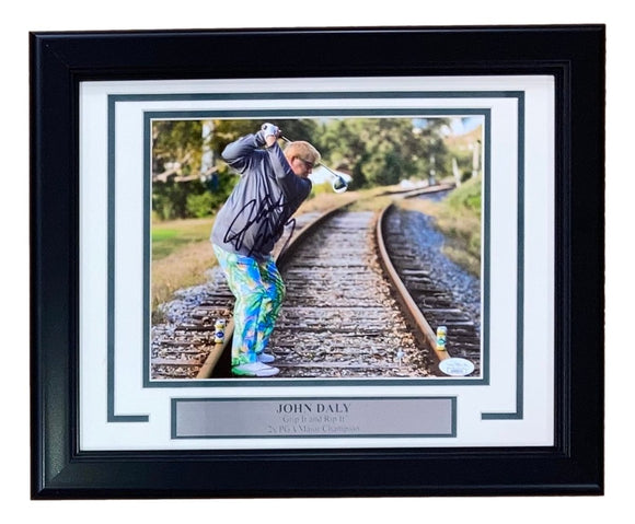 John Daly Signed In Dark Blue Framed 8x10 PGA Golf Railroad Tee Shot Photo JSA - Sports Integrity